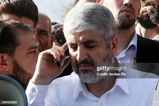 Khaled Mashal, the leader of the Islamic Palestinian organization HAMAS, grieves for his mother during her funeral on September 4 in Amman, Jordan....