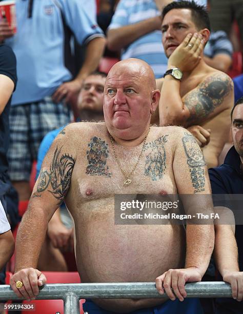Tattooed England fan looks on during the 2018 FIFA World Cup Group F qualifying match between Slovakia and England at City Arena on September 4, 2016...