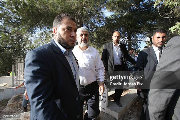 Khaled Mashal, the leader of the Islamic Palestinian organization HAMAS, leaves the cemetry after his mother was burried during her funeral on...