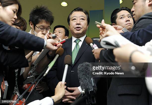 Iwaki, Japan - Japanese Prime Minister Yoshihiko Noda meets the press in Iwaki, Fukushima Prefecture on July 7 to comment on the Senkaku Islands in...