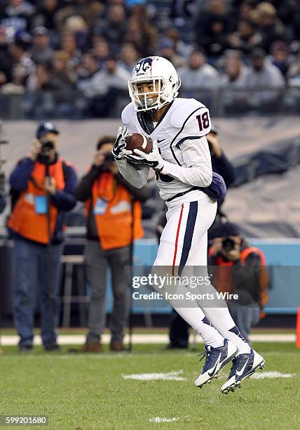 Uconn Huskies Quarterback Chandler Whitmer back to pass during a NCAA football game between the UConn Huskies and the Army Black Knights at Yankee...
