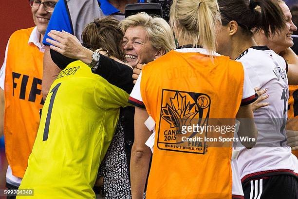 Germany goalkeeper Nadine Angerer hugs head coach Silvia Neid during the 2015 FIFA Women's World Cup Quarter final match between Germany and France...