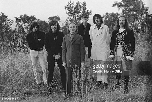 Dallas Taylor, Graham Nash, Stephen Stills, unknown person, Neil Young, and David Crosby.