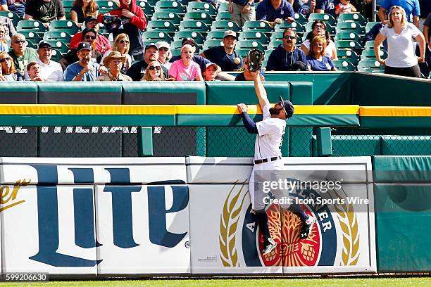 Detroit Tigers left fielder Tyler Collins attempts to catch a home run ball hit by Kansas City Royals designated hitter Kendrys Morales during the...