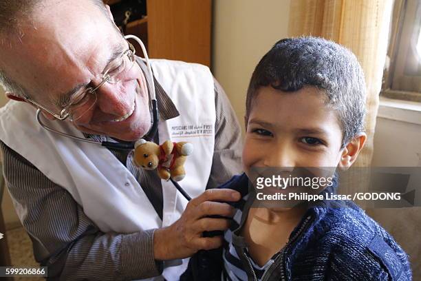 physicians for human rights, an israeli ngo, runs open clinics in the west bank. - palestinian boy stock pictures, royalty-free photos & images