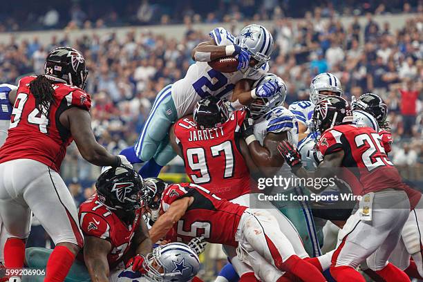 Dallas Cowboys Running Back Joseph Randle [18812] leaps over the line for a touchdown during the NFL game between the Atlanta Falcons and the Dallas...