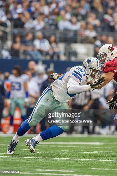 Dallas Cowboys defensive end DeMarcus Lawrence rushes around Arizona Cardinals tight end Rob Housler during a football game between the Dallas...