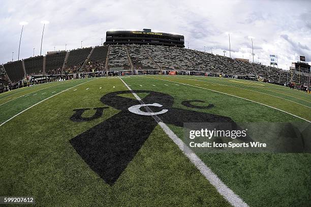 October 10, 2015 - A memorial ribbon is painted on the field at Autzen Stadium to commemorate the fallen victims of the Umpqua Community College...