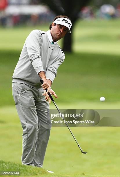 Bubba Watson chips up at the 3rd green during the final round of the Travelers Championship at TPC River Highlands in Cromwell, CT. After a two hole...