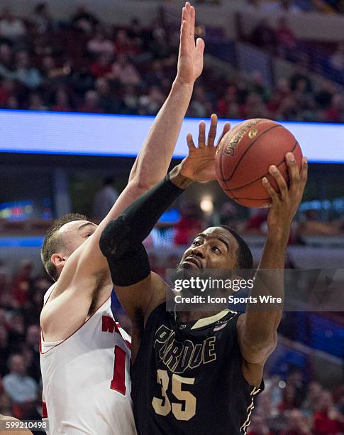 Purdue's Rapheal Davis takes a shot during the Big Ten Men's Basketball Tournament Semi Final game between the Wisconsin Badgers and the Purdue...