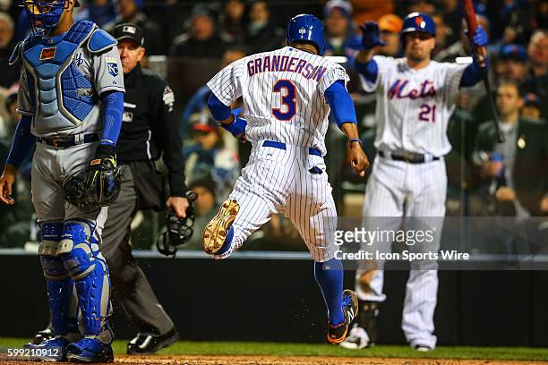 New York Mets right fielder Curtis Granderson scores during the sixth inning of Game 3 of the 2015 World Series between the New York Mets and the...