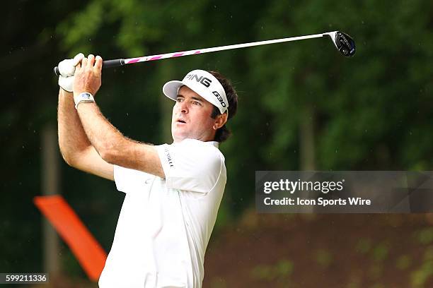 Bubba Watson watches his ball go to the right off the tee on 15 during the third round of the Travelers Championship at TPC River Highlands in...