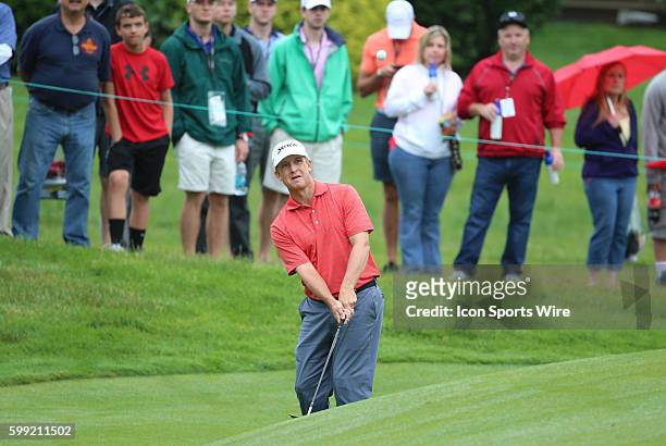 David Toms chips onto the 8th green during the final round of the Travelers Championship at TPC River Highlands in Cromwell, Connecticut.