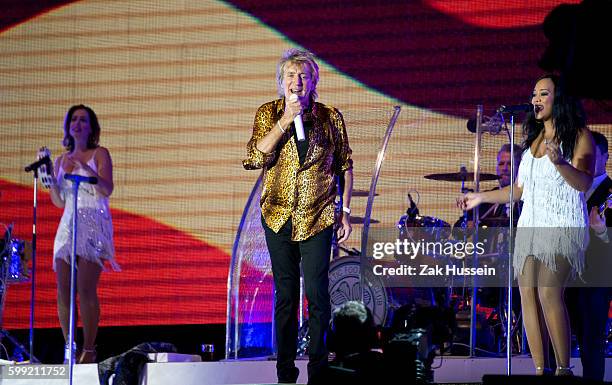 Rod Stewart performs live in Hyde Park in London.