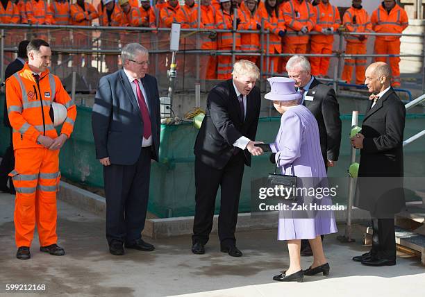 Queen Elizabeth II and Boris Johnson visit the Crossrail Station site at Bond Street in London