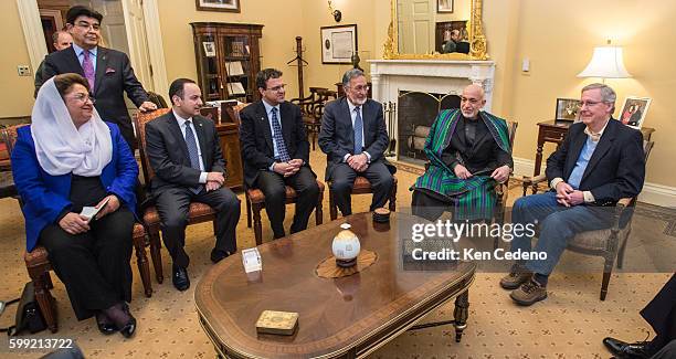 Senator Mitch McConnell , Sen. Bob Casey , Sen. Deb Fischer , and Sen. Tim Kaine , meet with President Karzai of Afghanistan on Capitol Hill January...