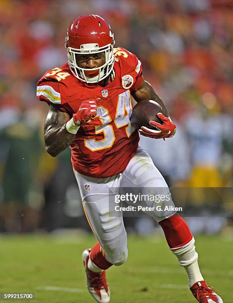 Running back Knile Davis of the Kansas City Chiefs runs with the ball against of the Green Bay Packers during the first half on September 1, 2016 at...