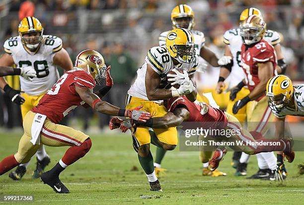 Running back John Crockett of the Green Bay Packers carries the ball against the San Francisco 49ers in the second half at Levi's Stadium on August...