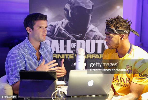 Sports reporter Rob Perez and NBA player D'Angelo Russell attend The Ultimate Fan Experience, Call Of Duty XP 2016, presented by Activision, at The...