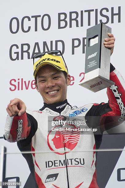 Takaaki Nakagami of Japan and Idemitsu Honda Team Asia celebrates the third place on the podium at the end of the Moto2 race during the MotoGp Of...