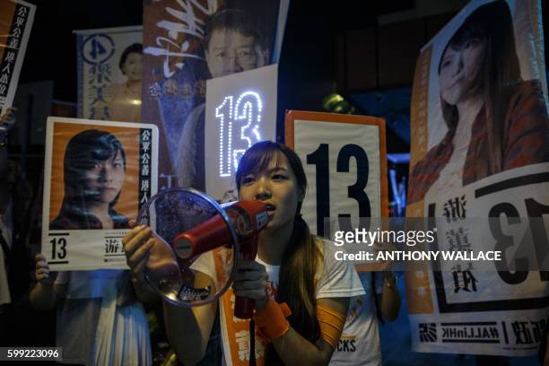 Localist political group Youngspiration candidate Yau Wai-ching campaigns during the Legislative Council election in Taikoo, Hong Kong on September...