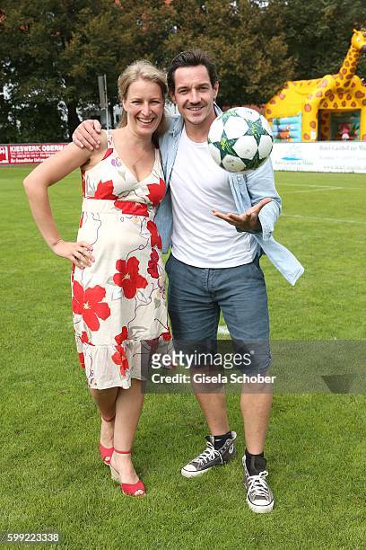 Stefanie von Poser and Markus Brandl, , die Bergretter, during the charity football game 'Kick for Kids' to benefit 'Die Seilschaft - zusammen sind...