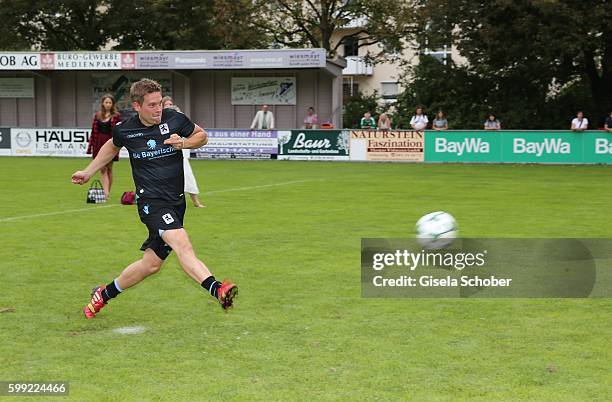 Joscha Kiefer plays soccer during the charity football game 'Kick for Kids' to benefit 'Die Seilschaft - zusammen sind wir stark e.V.' at the Prof....