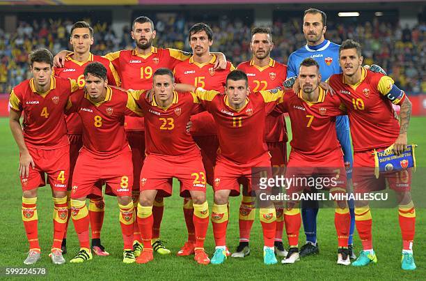 Montenegro's players pose for the team photo prior to the World Cup 2018 football qualification match between Romania and Montenegro in Cluj-Napoca,...