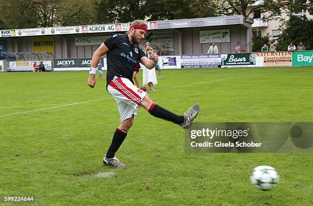 Sebastian Stroebel plays soccer, penalty kick, during the charity football game 'Kick for Kids' to benefit 'Die Seilschaft - zusammen sind wir stark...