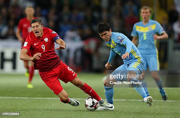 Yeldos Akhmetov , Robert Lewandowski , during the World Cup 2018 football qualification match between Kazakhstan and Poland in Astana, Kazakistan on...