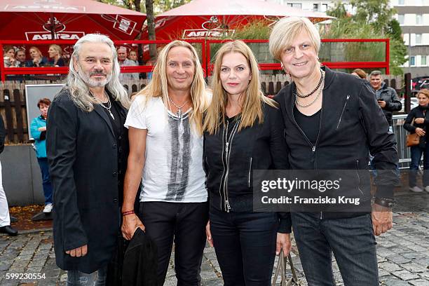 Hans-Juergen Reznicek, Uwe Hassbecker, Anna Loos and Ruediger Barton of the band Silly attend the 'Nacht der Legenden' at Schmidts Tivoli on...