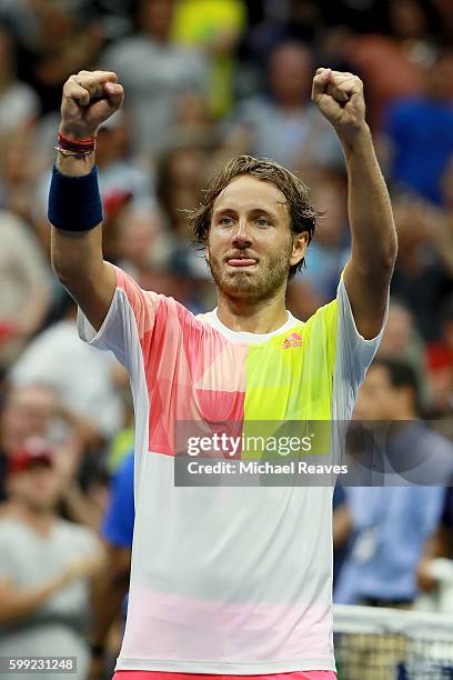 Lucas Pouille of France reacts after defeating Rafael Nadal of Spain during his fourth round Men's Singles match on Day Seven of the 2016 US Open at...