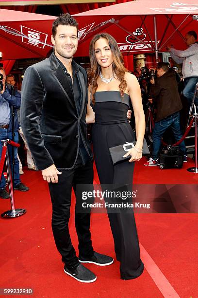 Former football player Michael Ballack and his girlfriend Natacha Tannous attend the 'Nacht der Legenden' at Schmidts Tivoli on September 04, 2016 in...