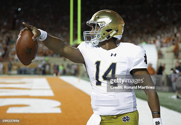 DeShone Kizer of the Notre Dame Fighting Irish celebrates scoring a 29-yard rushing touchdown during the third quarter against the Texas Longhorns at...