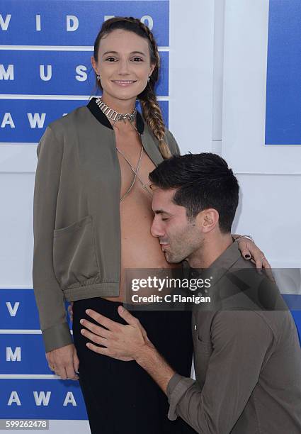 Producer Nev Schulman and Laura Perlongo attend the 2016 MTV Video Music Awards at Madison Square Garden on August 28, 2016 in New York City.