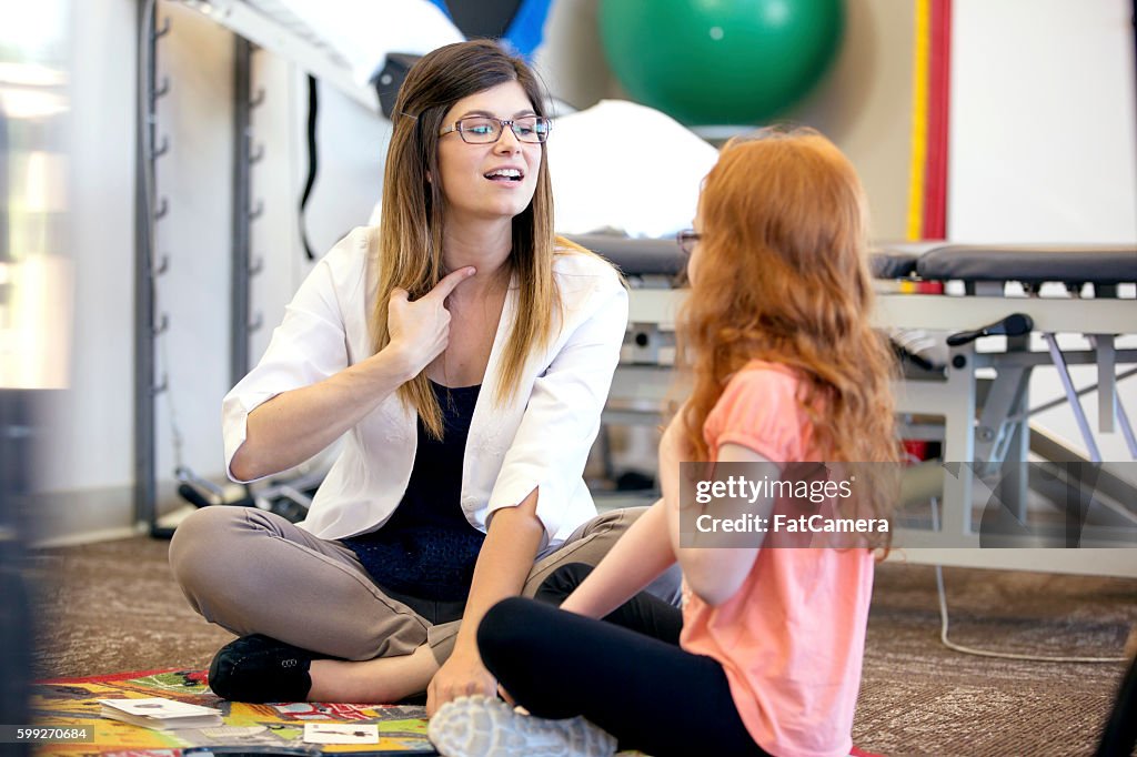 Slp Working Speech Therapist Working With A Young Child High-Res Stock Photo ...