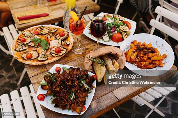 italian food at an italian restaurant in rome - cibo italiano foto e immagini stock