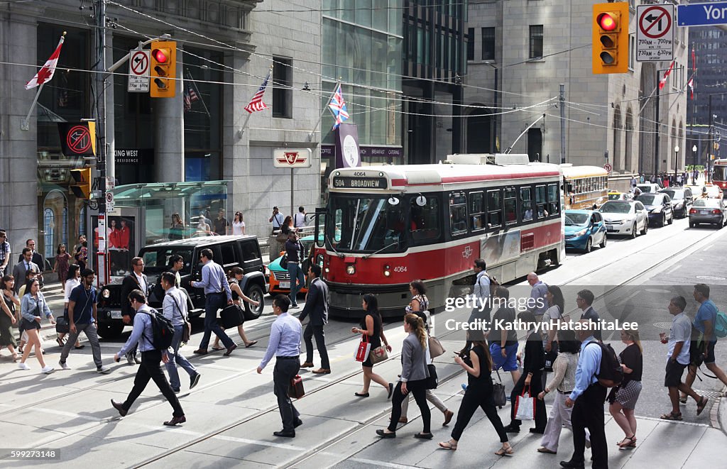 People Crossing King Street at Yonge, Downtown Toronto, Ontario, Canada