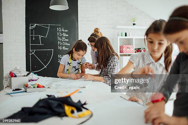 sewing class for kids. - sewing class stock pictures, royalty-free photos & images