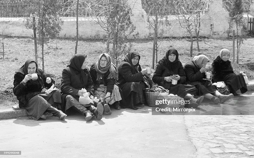 Women workers enjoy their lunch break in a Kiev park, Ukraine, USSR. May 1960 M4000