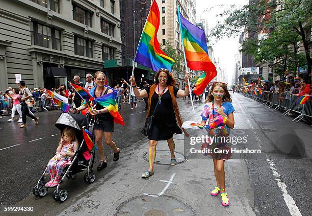 Participants march in the annual Gay Pride Parade in New York, June 28, 2015.