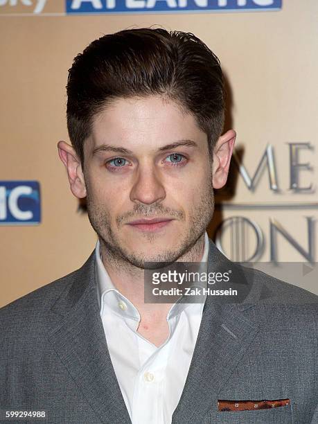 Iwan Rheon arriving at the world premiere of "Game of Thrones" Season 5 at the Tower of London.