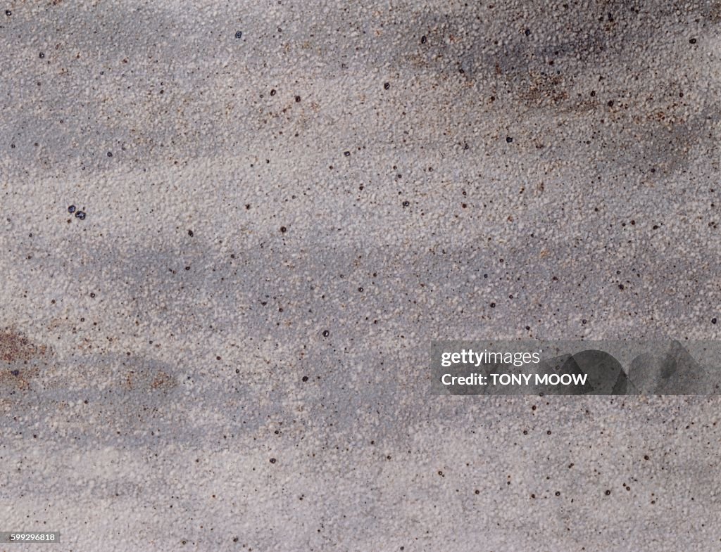 Gray ceramic panel with spotted pattern