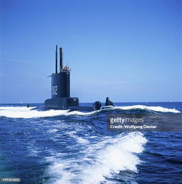 baltic sea, surfaced submarine - battleship stock pictures, royalty-free photos & images