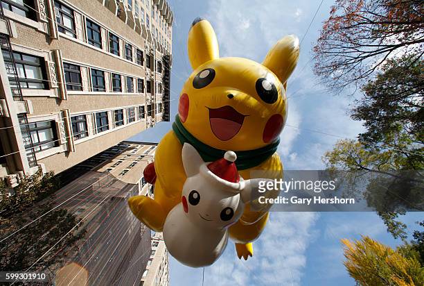 The Pikachu balloon floats down Central Park West in the Macy's Thanksgiving Day Parade in New York, November 26, 2015.