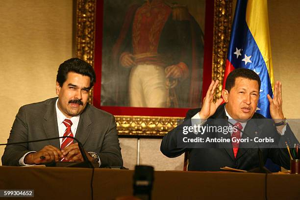 Venezuelan President Hugo Chavez , with Venezuelan Foreign Minister Nicolas Maduro, gives a press conference during his visit in Paris. Chavez said...