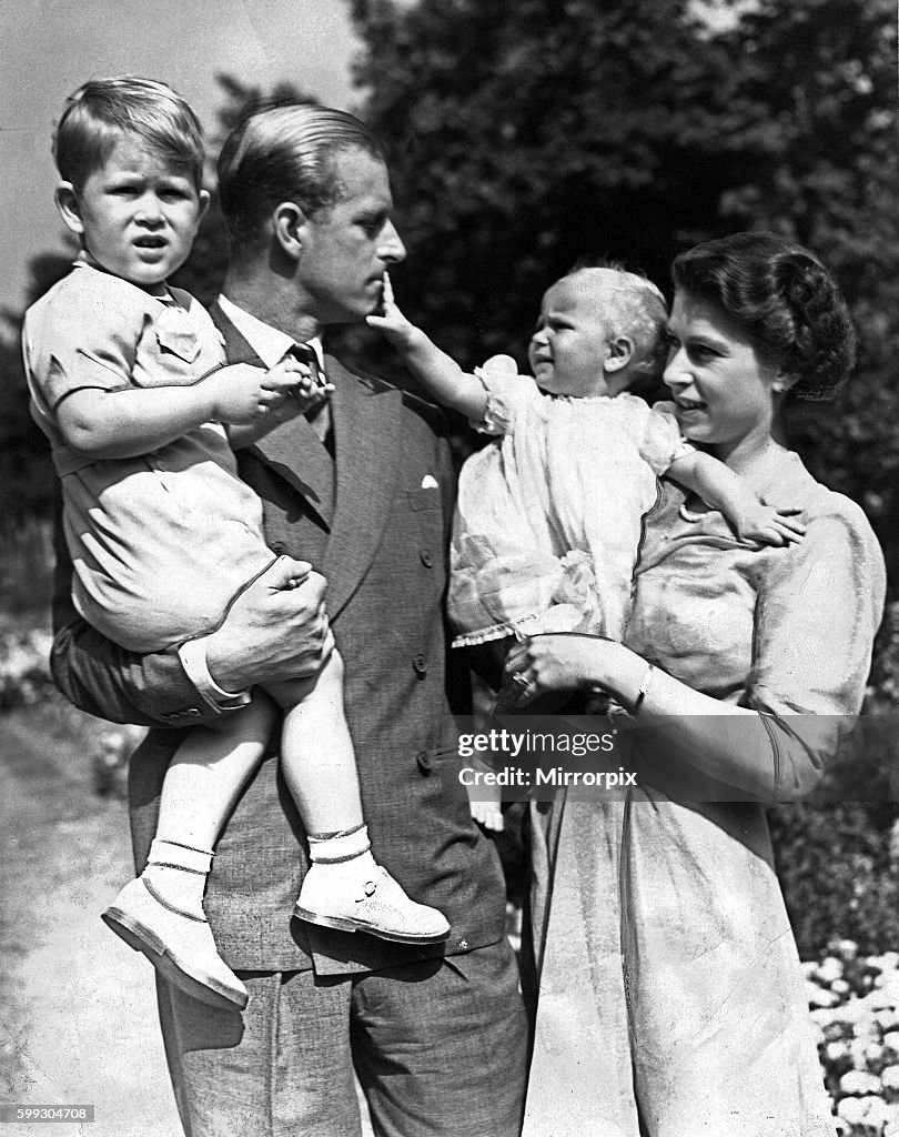 Queen Elizabeth II And Her Husband Prince Philip With Their Two News queen-elizabeth-ii-and-her-husband-prince-philip-with-their-two-news