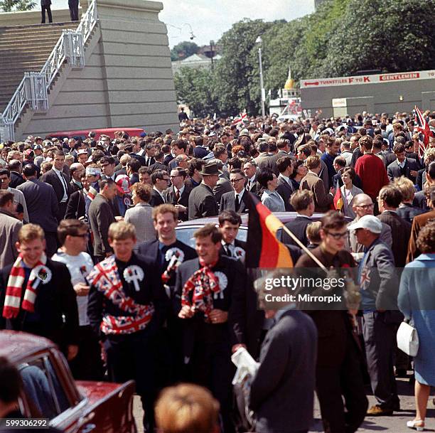 World Cup Football 1966 World Cup Final England beat West Germany 4 - 2. Crowds arriving at Wembley Stadium for the final match. Supporters Fans...