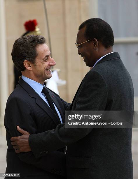 French President Nicolas Sarkozy welcomes Chadian President Idriss Deby at the Elysee Palace.