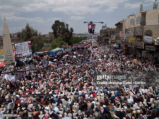 Thousands of People attend a demonstration against President Ali Abdullah Saleh in Sanaa, March 25 as Saleh and top dissident General Ali Mohsen...